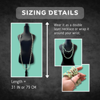 Sizing details graphic for a double-layer necklace, showing a black mannequin torso with the necklace displayed on it, a hand holding a coiled length of the necklace, and text stating the length is 31 inches or 79 cm. The background is a dark textured gray.