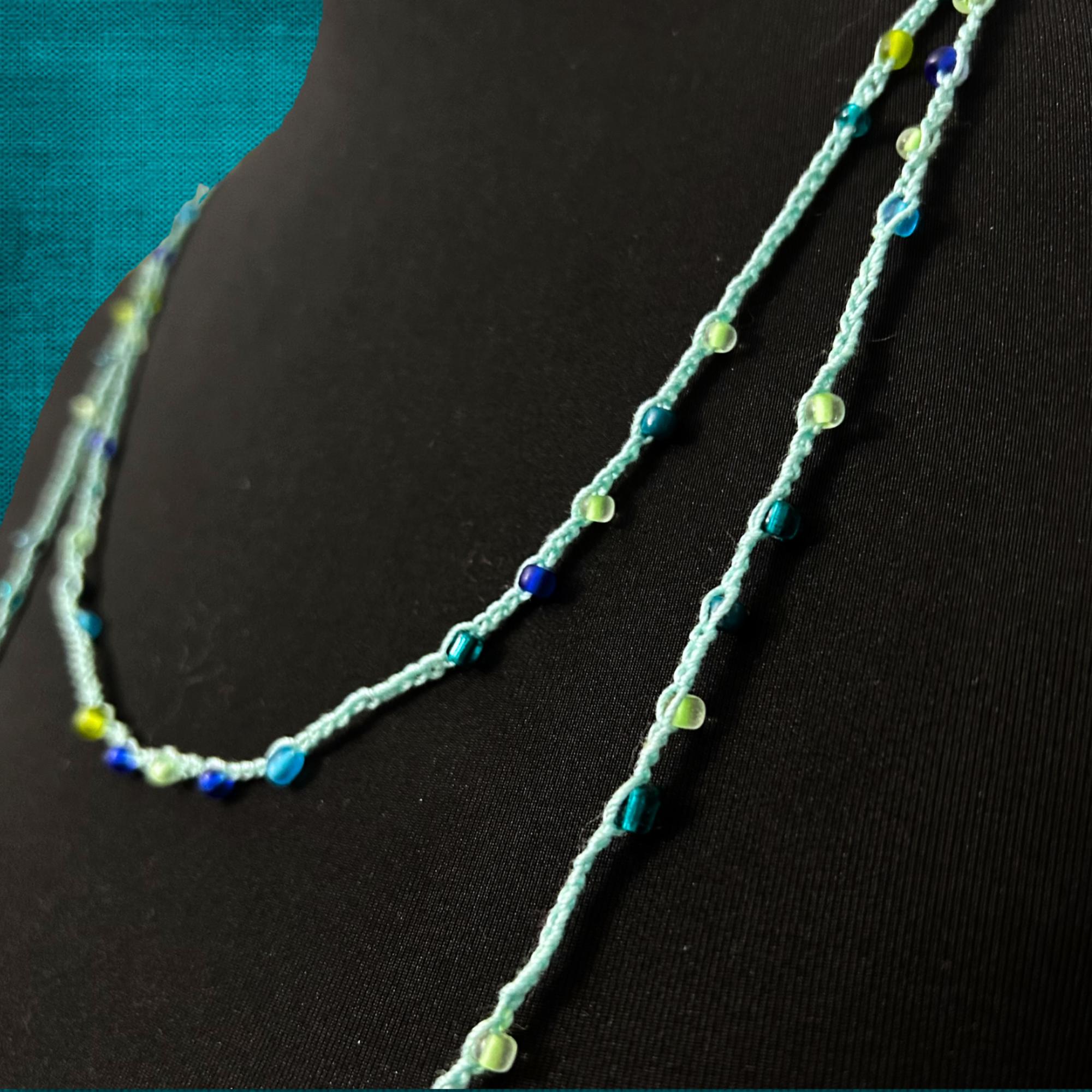 Teal Blue Glass Bead Infinity