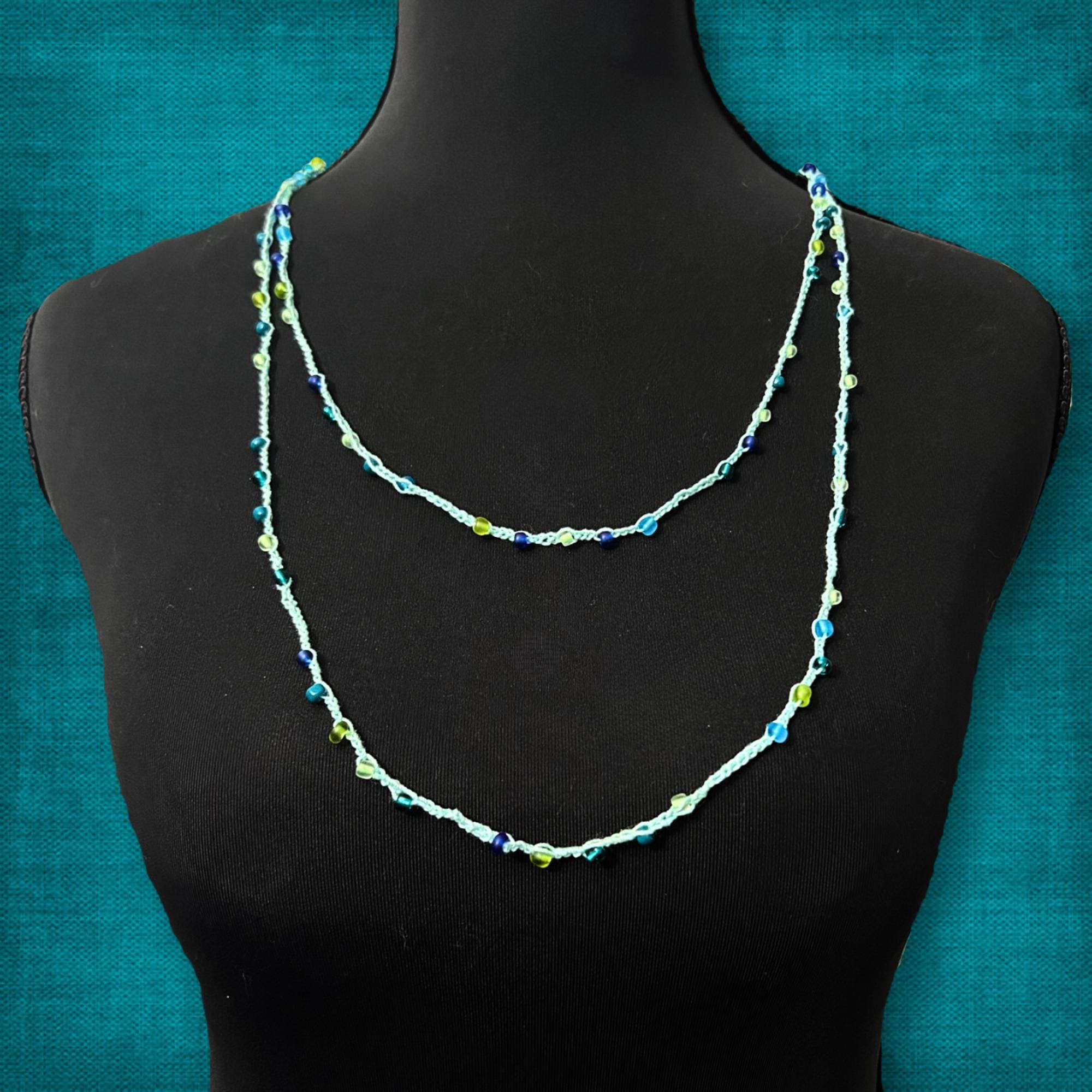Teal Blue Glass Bead Infinity